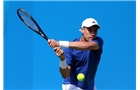 LONDON, ENGLAND - JUNE 08:  Farrukh Dustov of Uzbekistan in action during a qualifying match ahead of the AEGON Championships at Queens Club on June 8, 2014 in London, England.  (Photo by Jan Kruger/Getty Images)